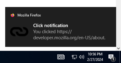 Beispiel einer Benachrichtigung auf Windows 10, oberhalb der Systemuhr, mit einem fettgedruckten Titel "Click notification", gefolgt von normalem Text "You clicked https://developer.mozilla.org/de/docs/MDN". Die Benachrichtigung hat ein kleines Firefox-Logo in der oberen linken Ecke, gefolgt von "Mozilla Firefox", und ein Link-Symbol links vom primären Benachrichtigungstext.